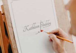 logo sketch for Author Kathleen Pendoley by Fat Cat Design